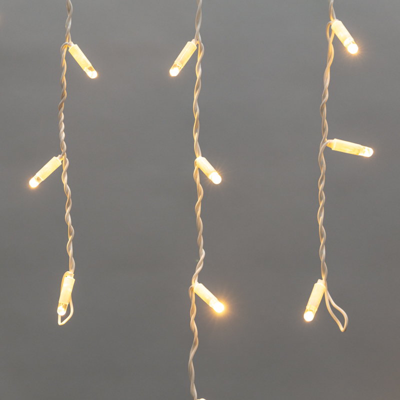 Гирлянда светодиодная Бахрома (Айсикл) 2,4х0,6м 88 LED ТЕПЛЫЙ БЕЛЫЙ белый ПВХ IP65 постоянное свечение 230В блок в комплекте NEON-NIGHT